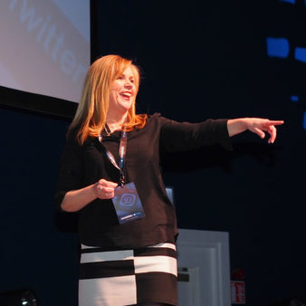 Samantha Kelly speaking at an event picture